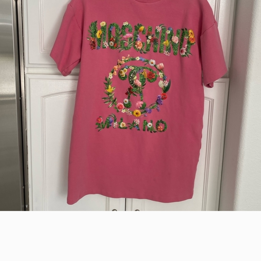 Vibrant Pink Shirt with Floral Design